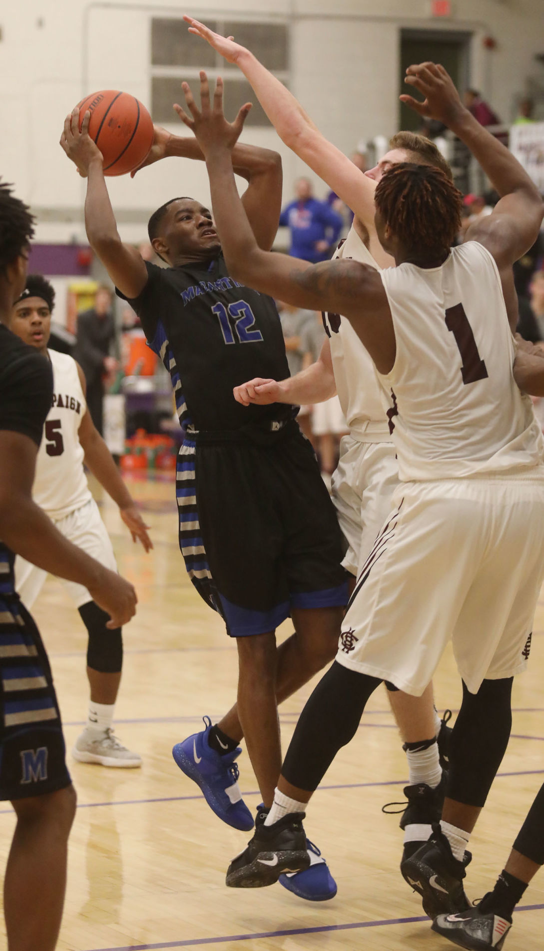MacArthur vs Champaign Central boys basketball 29 3.1.19.jpg